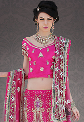 Let your personality speak for you this wedding lehenga embellished with embroidery work. This pink net lehenga choli is nicely embroidery and velvet patch work is done with stone, zardosi, cutdana and cutbeads work. All over embroidery work on lehenga is stunning. The beautiful heavy embroidery on lehenga made it awesome and gives you stylish and attractive look to others. Matching choli and dupatta is availble with this lehenga. Slight Color variations are possible due to differing screen and photograph resolutions.