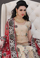 Be the cynosure of all eyes with this wonderful casual wear in flattering colors and combinations. This beige net lehenga choli is nicely embroidery and velvet patch work is done with resham, stone, zardosi, cutdana, beads and cutbeads work. All over embroidery work on lehenga is stunning. The beautiful heavy embroidery on lehenga made it awesome and gives you stylish and attractive look to others. Matching choli and red net dupatta is availble with this lehenga. Slight Color variations are possible due to differing screen and photograph resolutions.