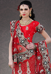 Dreamy variation on shape and forms compliment your style with tradition. This red net lehenga choli is nicely embroidery and velvet patch work is done with stone, zardosi, cutdana, beads and cutbeads work. All over embroidery work on lehenga is stunning. The beautiful heavy embroidery on lehenga made it awesome and gives you stylish and attractive look to others. Matching choli and dupatta is availble with this lehenga. Slight Color variations are possible due to differing screen and photograph resolutions.