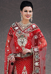 The evolution of style species collection spells pure femininity. This red net lehenga choli is nicely embroidery and velvet patch work is done with stone, zardosi, cutdana, beads and cutbeads work. All over embroidery work on lehenga is stunning. The beautiful heavy embroidery on lehenga made it awesome and gives you stylish and attractive look to others. Matching choli and dupatta is availble with this lehenga. Slight Color variations are possible due to differing screen and photograph resolutions.