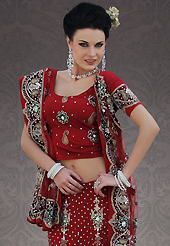 Bold colors created by the inventive drapes of textile catch the imagination like no other contemporary clothing. This maroon net lehenga choli is nicely embroidery and velvet patch work is done with stone, zardosi, cutdana, beads and cutbeads work. All over embroidery work on lehenga is stunning. The beautiful heavy embroidery on lehenga made it awesome and gives you stylish and attractive look to others. Matching choli and dupatta is availble with this lehenga. Slight Color variations are possible due to differing screen and photograph resolutions.
