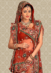 Be the cynosure of all eyes with this wonderful casual wear in flattering colors and combinations. This maroon net a-line lehenga is nicely embroidered and velvet patch work is done with zari, stone and cutbeads work. The beautiful embroidery on lehenga made it awesome and gives you stylish and attractive look to others. Matching choli and dupatta is availble with this lehenga. Slight Color variations are possible due to differing screen and photograph resolutions.