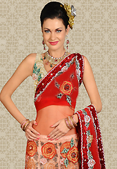 It’s cool and has a very modern look to impress all. This cream net a-line lehenga is nicely embroidered and velvet patch work is done with resham, stone and cutbeadswork. The beautiful embroidery on lehenga made it awesome and gives you stylish and attractive look to others. Matching choli and red net dupatta is availble with this lehenga. Slight Color variations are possible due to differing screen and photograph resolutions.