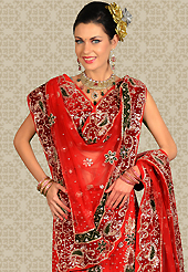 Take a look on the changing fashion of the season. This red net a-line lehenga is nicely embroidered and velvet patch work is done with zari, stone and cutbeads work. The beautiful embroidery on lehenga made it awesome and gives you stylish and attractive look to others. Matching choli and dupatta is availble with this lehenga. Slight Color variations are possible due to differing screen and photograph resolutions.