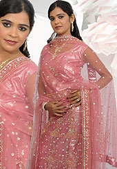 Its cool and have a very modern look to impress all. A Lehenga made with  Net fabric. This lehenga embellished with stone, sitara, zarkins, and resham work. The beautiful heavy embroidery made it awesome and gives you stylish and attractive look to others. The matching blouse and chunari are enhanced your personality. Slight Color variations possible due to differing screen and photograph resolutions.