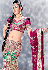 Its cool and have a very modern look to impress all. A Lehenga made with  shimmer fabric. This lehenga embellished with stone, sitara, zarkins, and resham work. The beautiful heavy embroidery made it awesome and gives you stylish and attractive look to others. The matching blouse and chunari are enhanced your personality. Slight Color variations possible due to differing screen and photograph resolutions.
