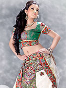 Today  fashion is really about sensuality which can be seen in this creation. Embellish yourself with the classy dress.  A Lehenga made with  georgette.  This lehenga embellished with stone, sitara, zarkins, and resham work. The beautiful heavy embroidery made it awesome and gives you stylish and attractive look to others. The matching blouse and chunari are enhanced your personality. Slight Color variations possible due to differing screen and photograph resolutions.