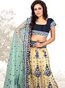 Outfit is a novel ways of getting yourself noticed. Tryout this season Pale yellow embroidery lehenga made with dupion and net fabric which is beautified with sequins, stone, zari and resham worked grave border and patches. Lehenga have also floral butti which gives a pretty look and chunari adorn border and butti increasing beauty of lehenga. Matching designer blouse is available. Slight Color variations are possible due to differing screen and photograph resolutions.