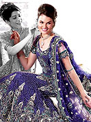 Make your collection more attractive and charming with this impressive dress. This drape blown up with Sequins, stone, zari, kundan, nag, resham and velvet patch work. Floral embroidery on lehenga and border make different to others. Contrast of color make attractive and impress to all. Lehenga with dupatta and choli gives you a singular and dissimilar look. Slight Color variations are possible due to differing screen and photograph resolutions.