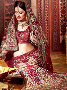 Symbol of fashion and beauty, each piece of our range of georgette lehenga choli is certain to increase your look. This drape blown up with Sequins, stone, zari, kundan, nag, resham and velvet patch work. Floral embroidery on lehenga and border make different to others. Contrast of color make attractive and impress to all. Lehenga with dupatta and choli gives you a singular and dissimilar look. Slight Color variations are possible due to differing screen and photograph resolutions.