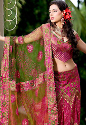 This season dazzle and shine in pure colors. An Amazing and beautiful lehenga choli nicely designed with resham, zari, sequins worked embroidery and fabric lace patch in floral patterns. This lehenga made with net and brocade fabric. Matching blouse and graceful dupatta is available. Slight Color variations are possible due to differing screen and photograph resolutions.