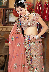 Elegance and innovation of designs crafted for you. A beautiful lehenga choli nicely designed with resham, zari, sequins, stone, cutdana and patch work. This lehenga made with faux georgette fabric. Matching blouse and graceful dupatta is available. Slight Color variations are possible due to differing screen and photograph resolutions.