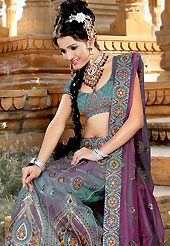 A most beautiful refinement for style and traditions. An Amazing and beautiful lehenga choli nicely designed with resham, zari, sequins, cutdana and patch work. This lehenga made with dupion silk and brocade fabric. Matching blouse and graceful dupatta is available. Slight Color variations are possible due to differing screen and photograph resolutions.