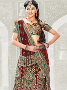 Today’s fashion is really about sensuality which can be seen in this creation. Embellish yourself with the classy dress. A bridal Lehenga made with georgette fabric with net dupatta. This drape is nicely designed with resham, stone, sitara, and zari work heavy embroidery. Amazing floral pattern work made it awesome and gives you elegant and gorgeous look to others. The matching blouse and chunari are enhanced your personality. Slight Color variations are possible due to differing screen and photograph resolutions.