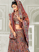 It’s cool and has a very modern look to impress all. A Lehenga made with georgette fabric with net dupatta. This lehenga beautified with stone, sitara, zari, and resham worked rich embroidery. The beautiful border and embroidery made it awesome and gives you stylish and attractive look to others. The matching blouse and chunari are enhanced your personality. Slight Color variations are possible due to differing screen and photograph resolutions.