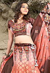 Embroidered lehengas are highly in order on a range of occasions such as wedding, formal party and festivals. This peach fish cut lehenga choli is nicely embroidered patch work. Embroidery is done with resham, sequins and cutdana work in form of floral motifs. The beautiful embroidery on lehenga made it awesome and gives you stylish and attractive look to others.Matching choli and dupatta is available with this lehenga. Accessories shown in the image is just for photography purpose. Slight Color variations are possible due to differing screen and photograph resolutions.
