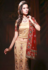 Take a look on the changing fashion of the season. This fawn net fishtail lehenga choli is nicely embroidered work done with resham, zircon, nakshi, stone and cutdana work in form of floral motifs. Embroidery work on all over lehenga is stunning. Border on dupatta made it stylish and fabulous, gives you a stunning look. The beautiful embroidery on lehenga made it awesome and gives you stylish and attractive look to others. Mixing of color make this lehenga an ethnic look and increasing your beauty. Matching choli and contrast maroon net dupatta is availble with this lehenga. Slight Color variations are possible due to differing screen and photograph resolutions.