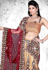 Embroidered lehengas are highly in order on a range of occasions such as wedding, formal party and festivals. This beige and maroon net lehenga choli is nicely embroidered patch work done with resham, zari, sequins, stone, cutdana, zardosi, swarovski and kasab worked rich embroidery on all over lehenga. The beautiful embroidery on lehenga made it awesome and gives you stylish and attractive look to others. Border on dupatta made it stylish and fabulous, gives you a stunning look. Matching choli and contrast maroon net dupatta is availble with this lehenga. The choli bust size can be customize upto 38 inches. Slight Color variations are possible due to differing screen and photograph resolutions.