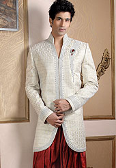 Today  fashion is really about sensuality which can be seen in this creation. Embellish yourself with the classy sherwani.  This sherwani made with pure Banarasi silk.  This sherwani embellished with stone, zardosi and stones  work. The beautiful heavy embroidery on collar made it awesome and gives you stylish and attractive look to others. Slight Color variations possible due to differing screen and photograph resolutions.