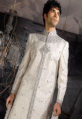 Make your collection more attractive with this dazzling sherwani. This sherwani made with brocade silk fabric. This sherwani embellished with sequins, stone, sitara work, and beads. Embroiderey work on collar, front and cuff made it stylish and fabulous, gives you a stunning look. Slight Color variations possible due to differing screen and photograph resolutions.