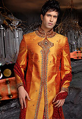 Its cool and have a very modern look to impress all. This sherwani made with pure silk fabric. This sherwani embellished with maroon patch, beads, sequins, and stone work. The beautiful heavy embroidery on collar, front, back and cuff made it awesome and gives you stylish and attractive look to others. The matching readymade  dhoti with heavy look gives you traditional look. Slight Color variations possible due to differing screen and photograph resolutions.