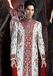 Its cool and have a very modern look to impress all. This sherwani made with art silk fabric. This sherwani embellished with beads, stone and  resham work. The beautiful heavy embroidery on collar, front, back and cuff made it awesome and gives you stylish and attractive look to others. The matching churidar is enhanced your personality. Slight Color variations possible due to differing screen and photograph resolutions.