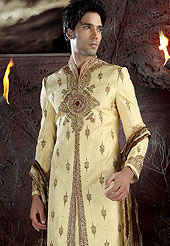 Make your collection more attractive with this dazzling sherwani. This sherwani made with brocade fabric. This sherwani embellished with beads, stone and  resham work. Embroiderey work on collar, front, back and cuff made it stylish and fabulous, gives you a stunning look. Slight Color variations possible due to differing screen and photograph resolutions.