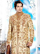 Emblem of fashion and style, each piece of our range of designer sherwani is certain to enhance your look as per todays trends. This cream sherwani embellished with zari, sequins, beads, stone and patch work. The beautiful heavy embroidery on front border, collar, back and cuffs made it awesome and gives you stylish and attractive look to others. Contrasting churidar is enhanced your personality. This sherwani made with cotton silk fabric. Accessories shown in the image is just for photography purpose. Slight Color variations are possible due to differing screen and photograph resolutions.