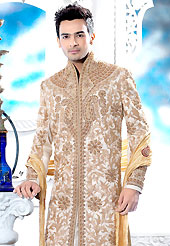 Make your collection more attractive with this dazzling dress. This cream sherwani embellished with heavy resham, zari, beads, sequins, stone and patch work. The beautiful heavy embroidery on front border, collar, back and cuffs made it awesome and gives you stylish and attractive look to others. Contrasting churidar is enhanced your personality. This sherwani made with cotton silk fabric. Accessories shown in the image is just for photography purpose. Slight Color variations are possible due to differing screen and photograph resolutions.