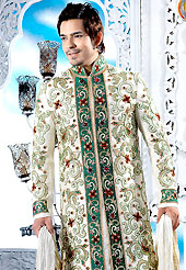 Make your collection more attractive with this dazzling dress. This cream sherwani embellished with green patch, fancy crystal, beads, sequins, stone and pitta work. The beautiful heavy embroidery on front border, collar, back and cuffs made it awesome and gives you stylish and attractive look to others. Contrasting churidar is enhanced your personality. This sherwani made with cotton silk fabric. Accessories shown in the image is just for photography purpose. Slight Color variations are possible due to differing screen and photograph resolutions.
