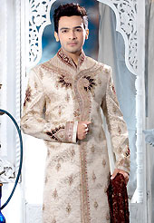 Today fashion is really about sensuality which can be seen in this creation. This light peach sherwani embellished with resham, zari, sequins, beads, cutdana, stone and patch work. The beautiful embroidery on front border, collar, back and cuffs made it awesome and gives you stylish and attractive look to others. Contrasting churidar is enhanced your personality. This sherwani made with cotton silk fabric. Accessories shown in the image is just for photography purpose. Slight Color variations are possible due to differing screen and photograph resolutions.