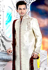 Today fashion is really about sensuality which can be seen in this creation. This off white elegant sherwani designed with cutdana, beads, stone and patch work. The beautiful heavy embroidery on front border, collar, back and cuffs made it awesome and gives you stylish and attractive look to others. Contrasting churidar is enhanced your personality. This sherwani made with jacquard fabric. Accessories shown in the image is just for photography purpose. Slight Color variations are possible due to differing screen and photograph resolutions.