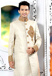 Emblem of fashion and style, each piece of our range of designer sherwani is certain to enhance your look as per todays trends. This cream elegant sherwani designed with zardoshi, zarkan, cutdana, stone and patch work. The beautiful heavy embroidery on front border, collar, back and cuffs made it awesome and gives you stylish and attractive look to others. Contrasting churidar is enhanced your personality. This sherwani made with jacquard fabric. Accessories shown in the image is just for photography purpose. Slight Color variations are possible due to differing screen and photograph resolutions.