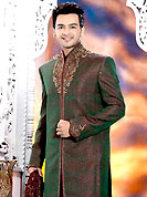 Its cool and have a very modern look to impress all. This deep green elegant sherwani designed with all over beads, zarkan, zardosi, stone and patch work. The beautiful heavy embroidery on front border, collar, back and cuffs made it awesome and gives you stylish and attractive look to others. Contrasting dhoti is enhanced your personality. This sherwani made with jacquard fabric. Accessories shown in the image is just for photography purpose. Slight Color variations are possible due to differing screen and photograph resolutions.