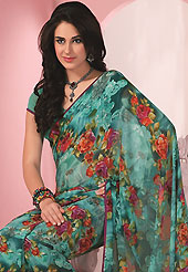 Try out this year top trend, glowing, bold and natural collection. This aqua blue faux georgette saree is simply designed with floral print work. This beautiful saree is used for casual porpose which gives you a singular and dissimilar look. Color blend of this saree is nice. Matching blouse is available with this saree. Slight color variations possible due to differing screen and photograph resolution.