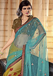 Emblem of fashion and beauty, each piece of our range of embroidered saree is certain to enhance your look as per today’s trends. This Drape has a beautiful embroidered border and patch work done with resham and zari work in form of floral motifs make different to others and gives a complete look. This saree with designer  make you trendy look. Color blend of this saree is nice. This saree is made with net fabric. Contrasting golden brown brocade blouse is available. Slight color variations are possible due to differing screen and photograph resolution.