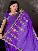 Ultimate collection of embroidery sarees with fabulous style. This purple saree have beautiful embroidery work which is embellished with resham and zari work in form of floral motifs. Beautiful embroidery patch work border on saree make attractive to impress all. This beautiful drape is crafted with georgette fabric. Matching blouse is available. This saree is also available in red, green, pink, peach, aqua, orange, voilet colors. Slight Color variations are possible due to differing screen and photograph resolutions.