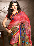 Welcome to the new era of Indian fashion wear. This saree is nicely designed with floral, stripe print and embroidered patch work. Embroidery is done with resham and zari work in form of floral motifs. Beautiful combinations of print and embroidered patch work on saree make attractive to impress all. This saree gives you a modern and different look in fabulous style. Matching blouse is available with this saree. This saree is also available in Turquoise Green and Purple, Dark Orange and Red, Pastel Green and Blue colors. Slight color variations are possible due to differing screen and photograph resolution.