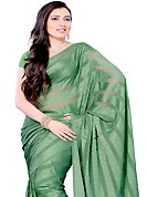 Bold colors created by the inventive drapes of textile catch the imagination like no other contemporary clothing. This saree is beautifully designed with self weaving work. This fabulous party wear saree is specially crafted for your stunning and gorgeous look. This beautiful drape is crafted with georgette fabric. Matching Blouse is available with this saree. Slight Color variations are possible due to differing screen and photograph resolutions.