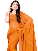 Try out this year top trend, glowing, bold and natural collection. This saree is beautifully designed with self weaving work in form of floral motifs. This fabulous party wear saree is specially crafted for your stunning and gorgeous look. This beautiful drape is crafted with georgette fabric. Matching Blouse is available with this saree. Slight Color variations are possible due to differing screen and photograph resolutions.