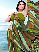 Era with extension in fashion, style, Grace and elegance have developed grand love affair with this ethnical wear. This saree is nicely designed with flower and wave print work in fabulous style. This beautiful saree is used for festival and casual porpose which gives you a singular and dissimilar look. This saree is made with faux georgette fabric. Matching blouse is available with this saree. Slight Color variations are possible due to differing screen and photograph resolutions.