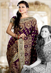 Exquisite combination of color, fabric can be seen here. This purple crepe saree is nicely designed with embroidered and silk patch work in fabulous style. Embroidery is done with zari, sequins, stone, cutdana, kasab and cut motti work in form of floral and paisley motifs. Beautiful broad heavy embroidery patch border on saree make attractive to impress all. This saree gives you a modern and different look in fabulous style. Matching blouse is available with this saree. Slight color variations are possible due to differing screen and photograph resolution.