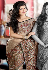 Elegance and innovation of designs crafted for you. This fawn and maroon half half shimmer faux georgette and net saree is nicely designed with embroidered and net patch work in fabulous style. Embroidery is done with resham, zari, sequins, stone, cutdana, kasab and cut moti work in form of floral motifs. Beautiful embroidery work on saree make attractive to impress all. This saree gives you a modern and different look in fabulous style. Matching blouse is available with this saree. Slight color variations are possible due to differing screen and photograph resolution.