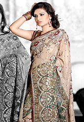 Be the cynosure of all eyes with this wonderful casual wear in flattering colors and combinations. This fawn and green half half shimmer faux georgette and net saree is nicely designed with embroidered and net patch work in fabulous style. Embroidery is done with resham, zari, sequins, stone, cutdana, kasab and cut moti work in form of floral motifs. Beautiful embroidery work on saree make attractive to impress all. This saree gives you a modern and different look in fabulous style. Matching blouse is available with this saree. Slight color variations are possible due to differing screen and photograph resolution.