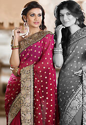 The very silhouette and styling of this outfit proves quiet flattering for most body types and renders a rather grand and majestic appeal. This shaded magenta faux georgette saree is nicely designed with embroidered and silk patch work in fabulous style. Embroidery is done with zari, sequins, stone, kasab and cutdana work in form of floral motifs. Beautiful broad embroidery patch border on saree make attractive to impress all. This saree gives you a modern and different look in fabulous style. Matching blouse is available with this saree. Slight color variations are possible due to differing screen and photograph resolution.