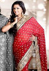 Different colors are a perfect blend of traditional Indian heritage and contemporary artwork. This shaded maroon faux georgette saree is nicely designed with embroidered and silk patch work in fabulous style. Embroidery is done with zari, sequins, stone, kasab and cutdana work in form of floral motifs. Beautiful broad embroidery patch border on saree make attractive to impress all. This saree gives you a modern and different look in fabulous style. Matching blouse is available with this saree. Slight color variations are possible due to differing screen and photograph resolution.
