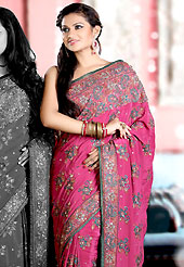 Breathtaking collection of sarees with stylish embroidery work and fabulous style. This dark pink crepe saree is nicely designed with embroidered and silk patch work in fabulous style. Embroidery is done with resham, zari, sequins, stone and cutdana work in form of floral motifs. Beautiful embroidery work on saree make attractive to impress all. This saree gives you a modern and different look in fabulous style. Matching blouse is available with this saree. Slight color variations are possible due to differing screen and photograph resolution.