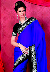 Different colors are a perfect blend of traditional Indian heritage and contemporary artwork. This dark blue plain saree is nicely designed with resham and patch work in fabulous style. Grave Border make different to others and gives a complete look. Color blend of this saree is nice. This saree is made with crepe fabric. Contrasting black blouse is available. Accessories shown in the image is just for photography purpose. Slight color variations are possible due to differing screen and photograph resolution.