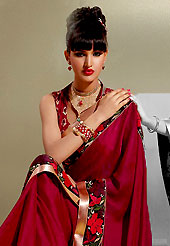 Style and trend will be at the peak of your beauty when you adorn this saree. This maroon crepe saree is nicely designed with resham and patch in form of floral motifs. Beautiful patch border on saree make attractive to impress all. This saree gives you a modern and different look in fabulous style. Matching blouse is available with this saree. Slight color variations are possible due to differing screen and photograph resolution.