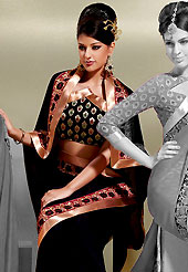 Style and trend will be at the peak of your beauty when you adorn this saree. This black crepe saree is nicely designed with resham and patch in form of floral motifs. Beautiful patch border on saree make attractive to impress all. This saree gives you a modern and different look in fabulous style. Matching blouse is available with this saree. Slight color variations are possible due to differing screen and photograph resolution.